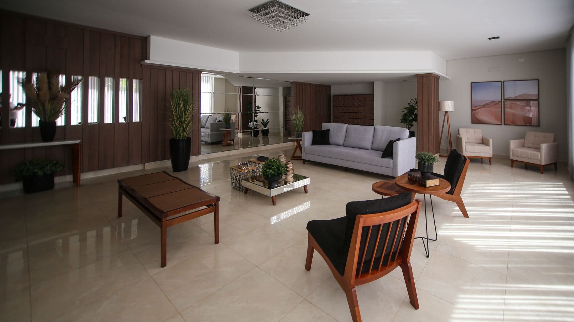 A spacious and luxurious living room featuring stylish furniture and elegant decor elements for a modern home.