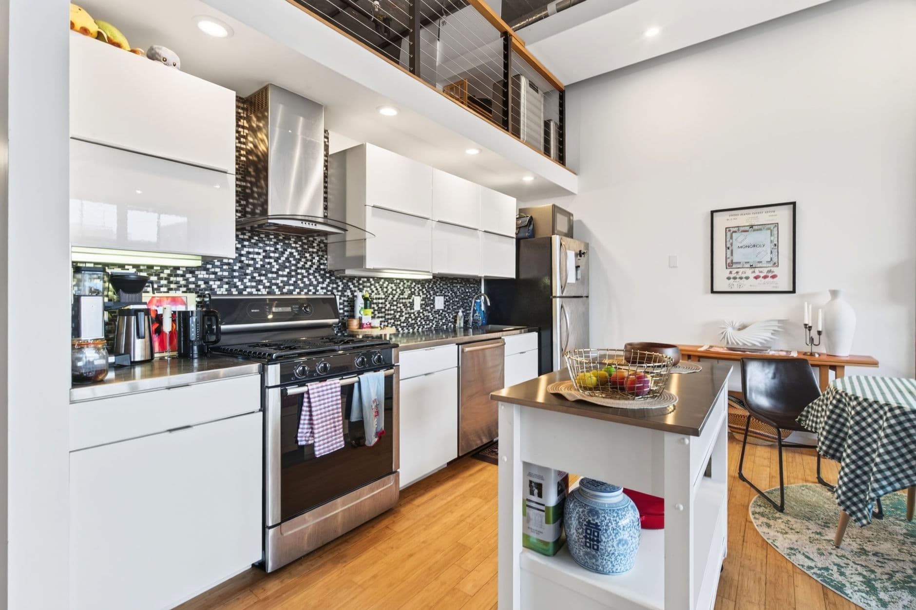 Spacious modern kitchen with sleek design and amenities in a Boston luxury apartment.