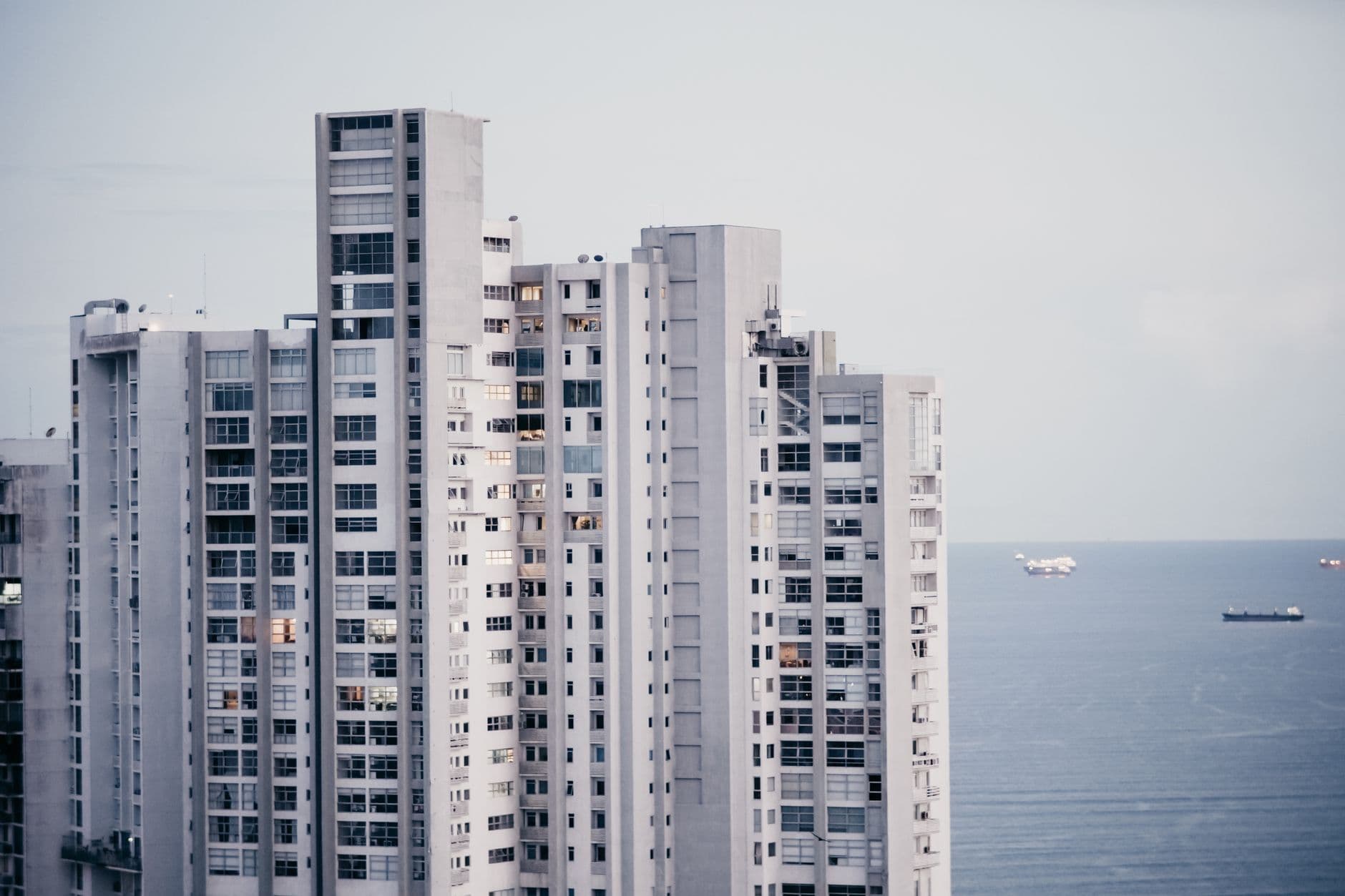 Modern skyscrapers with an ocean view, capturing an urban coastal ambiance.