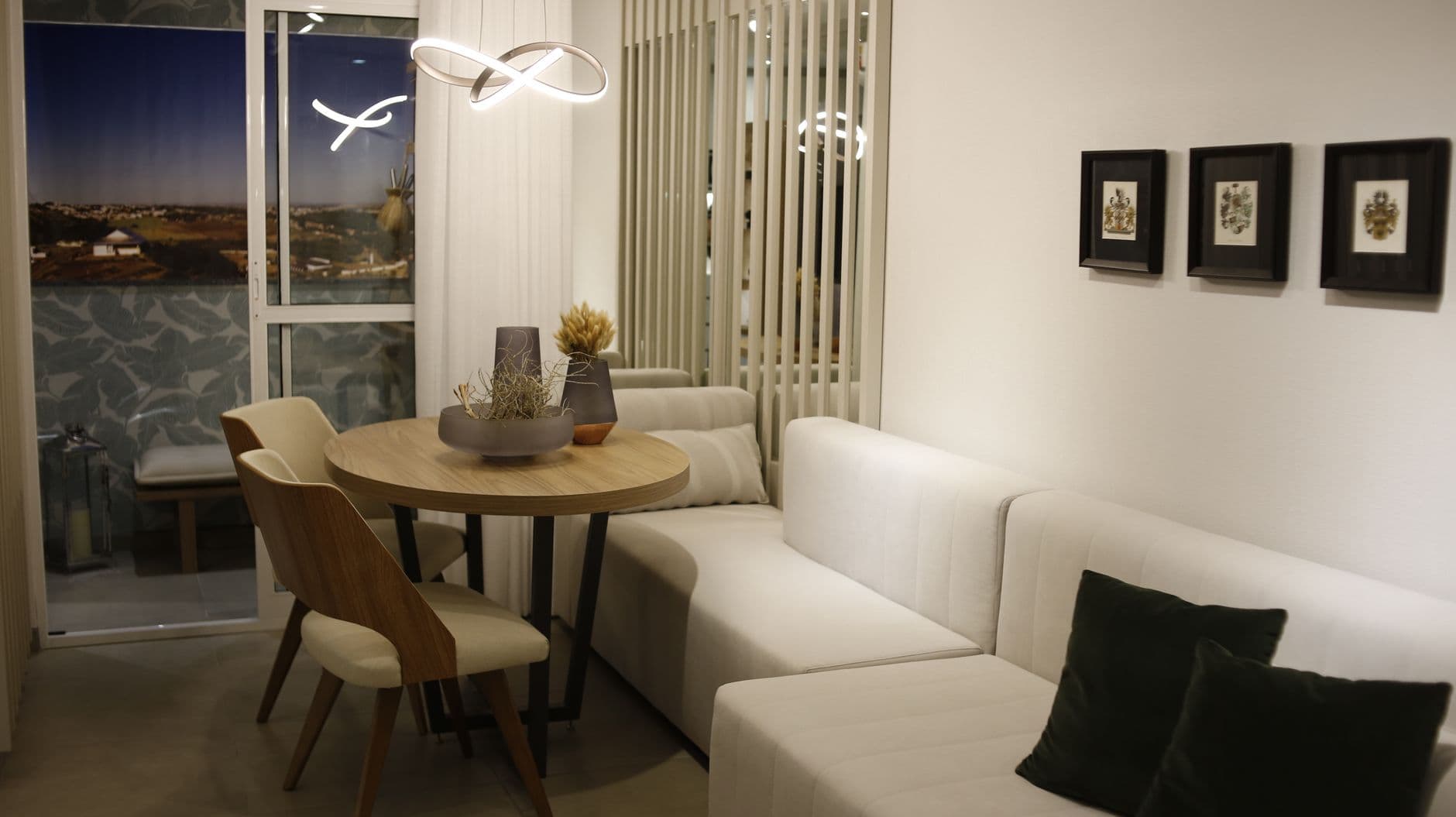A contemporary living room featuring minimalist Scandinavian design with sleek furniture and stylish lighting.